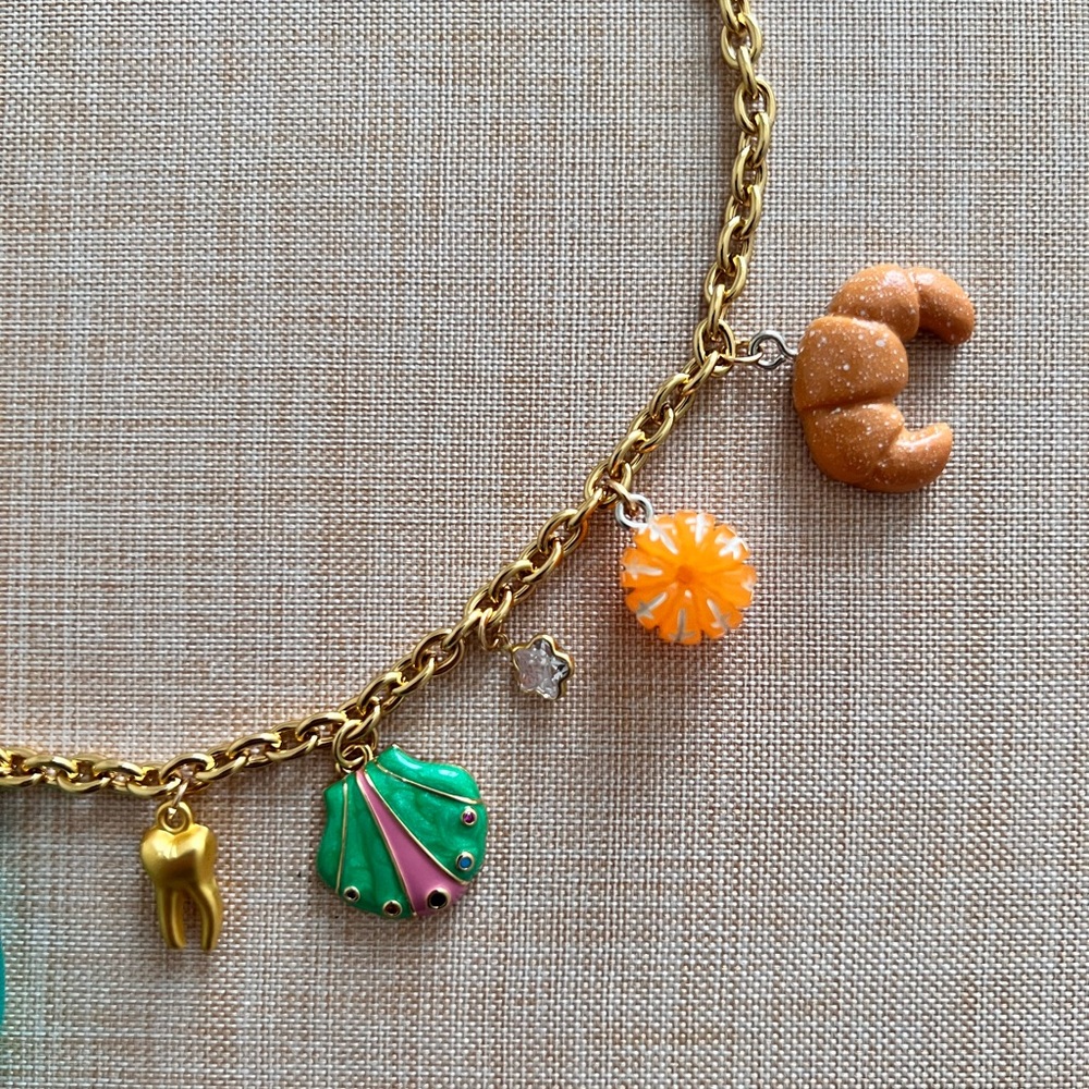Very adorable charm necklace with gold chain - Picture 3 of 5